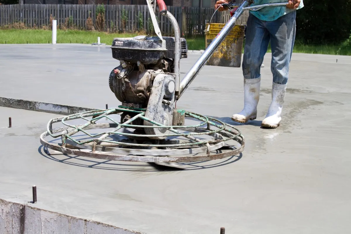 power trowel smoothing out concrete