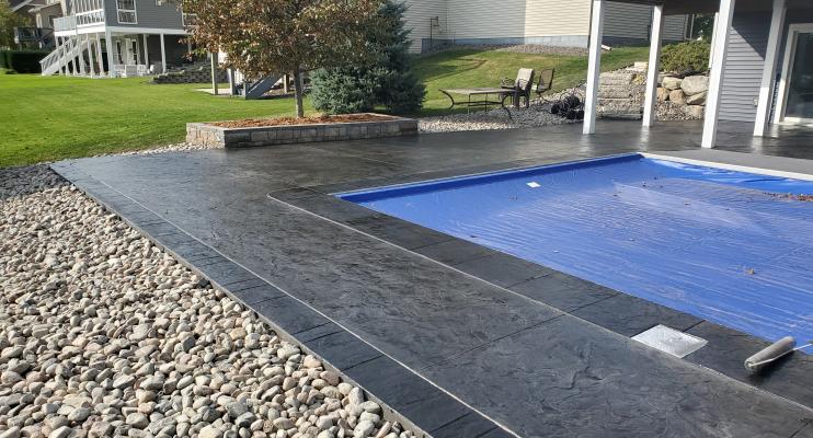 stamped concrete pool surround