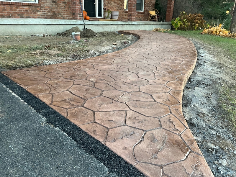 stamped-concrete-walkway-random-stone-brown-red-1