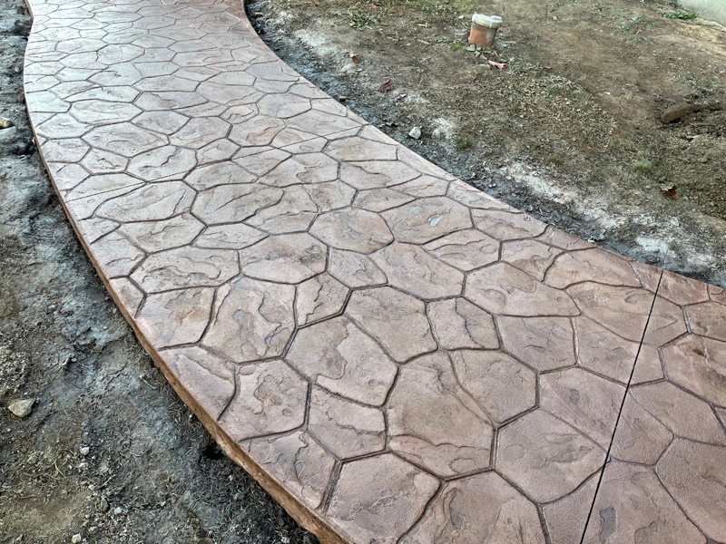 stamped-concrete-walkway-random-stone-brown-red-3