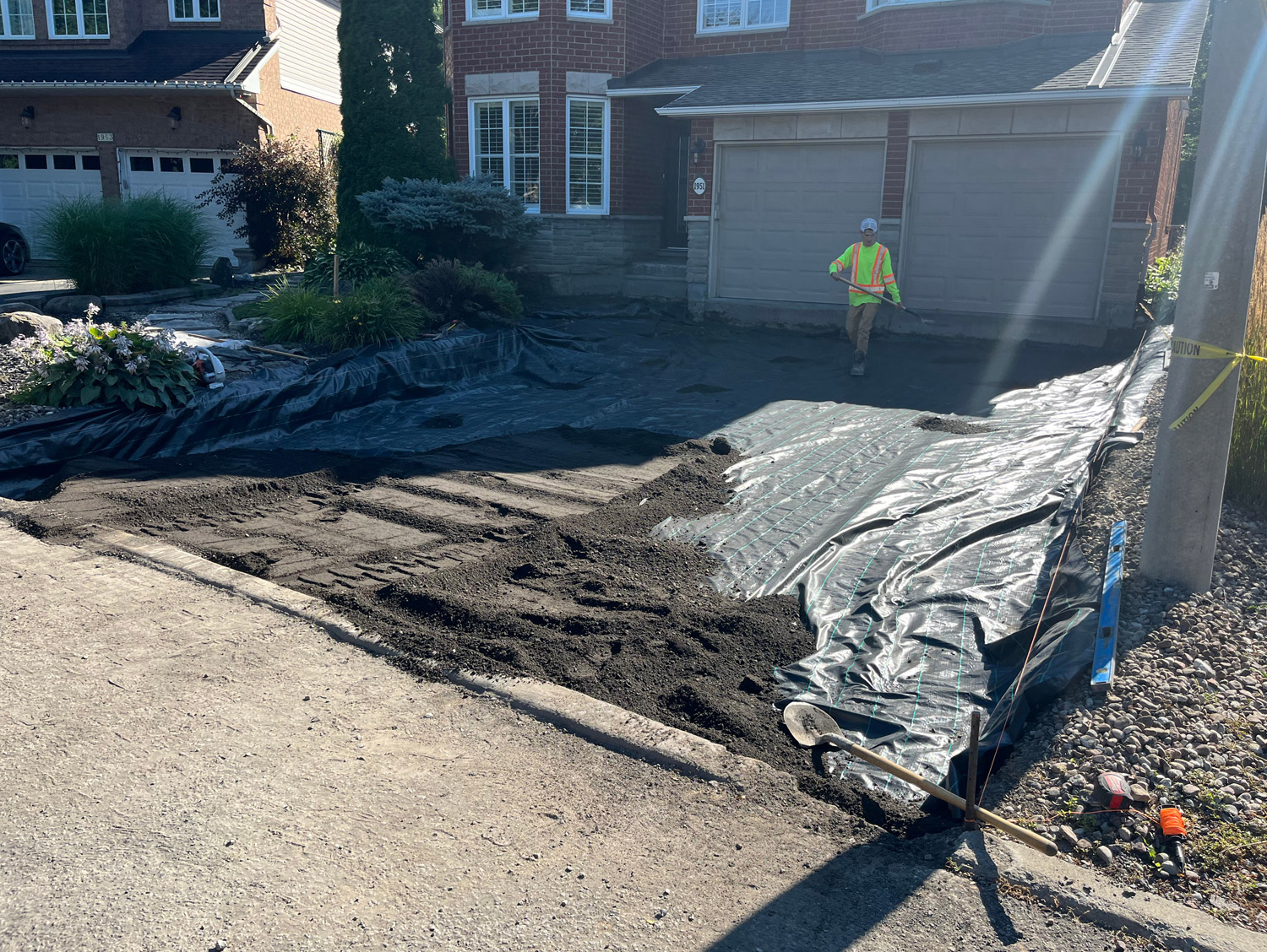 driveway dug out and filled with gravel