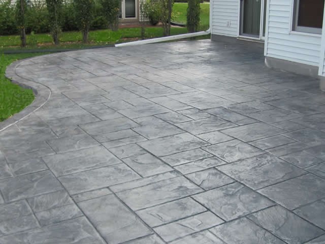 ottawa stamped conrete back patio in grey ashlar slate