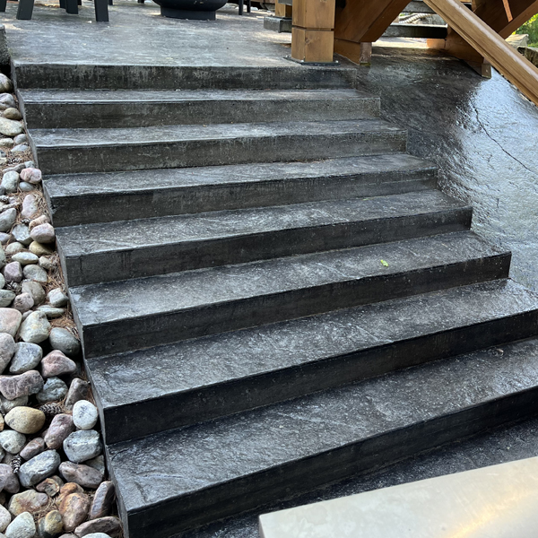 concrete steps with plain face and stamped tread